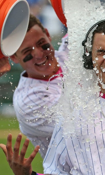 Cubs walk Bryce Harper six times, survive Nats on walk-off homer